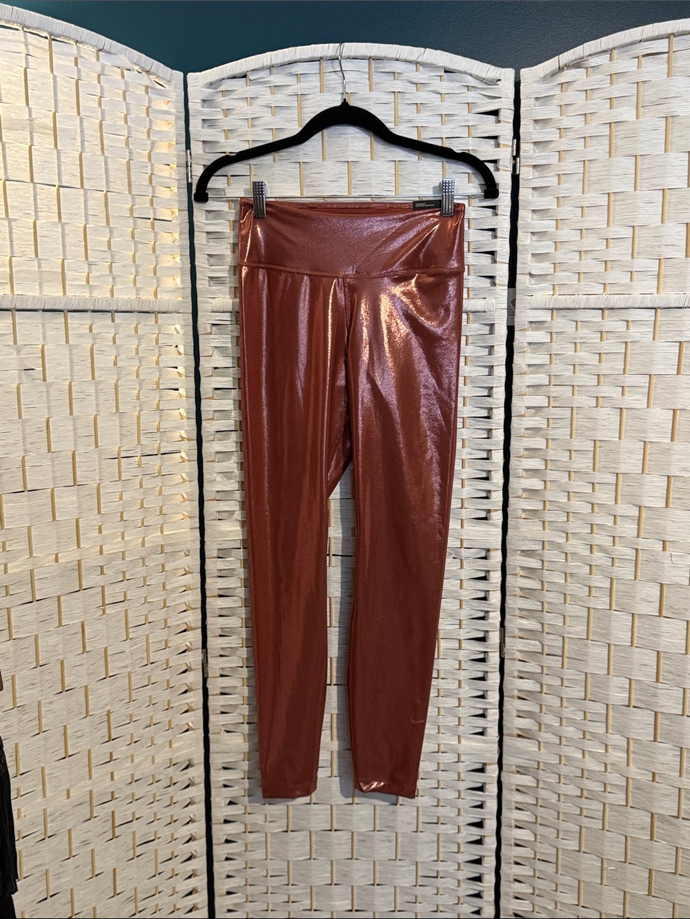 Nike Shiny Rust Brown women’s Leggings in size small,